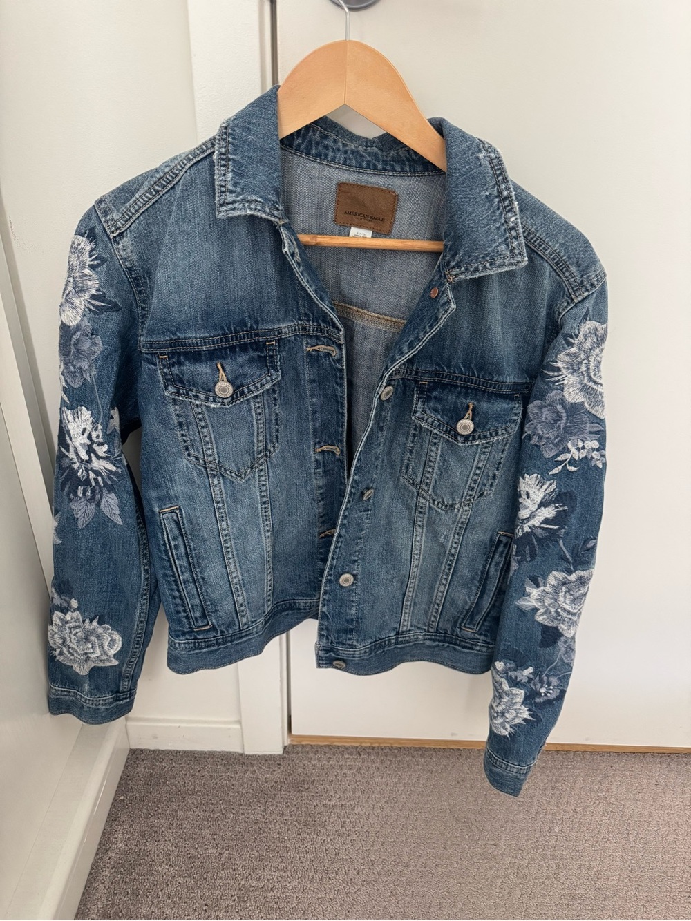 American Eagle Outfitters Blue Denim Jacket with White Floral Embroidery